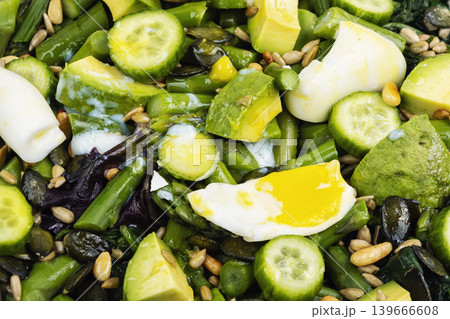Healthy green vegetable salad with avocado and asparagus Healthy green vegetable salad with avocado and asparagus 139666608