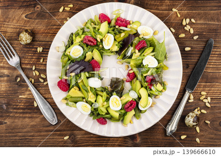 Fresh Green Salad with Asparagus, Avocado, Quail Eggs and Raspberries Fresh Green Salad with Asparagus, Avocado, Quail Eggs and Raspberries 139666610
