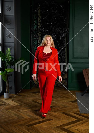 Ambitious individual exhibits confidence amid elegant surroundings 139667344