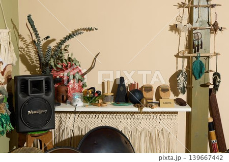 Musical performance area showcasing speakers and instruments 139667442
