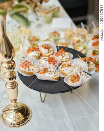 Sophisticated canape tower showcased with decorative accents and textures Sophisticated canape tower showcased with decorative accents and textures 139667658