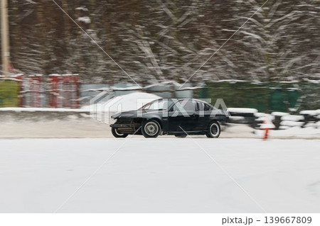 Engineers analyze vehicle behavior during winter handling tests Engineers analyze vehicle behavior during winter handling tests 139667809