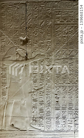 Beautiful bas-reliefs and ancient hieroglyphs in the Temple of Seti I in Abydos, Egypt. 139668154