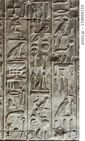 Beautiful bas-reliefs and ancient hieroglyphs in the Temple of Seti I in Abydos, Egypt. Beautiful bas-reliefs and ancient hieroglyphs in the Temple of Seti I in Abydos, Egypt. 139668158