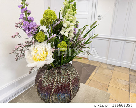Elegant Spring Flower Bouquet in Decorative Ceramic Vase. Elegant Spring Flower Bouquet in Decorative Ceramic Vase. 139668359