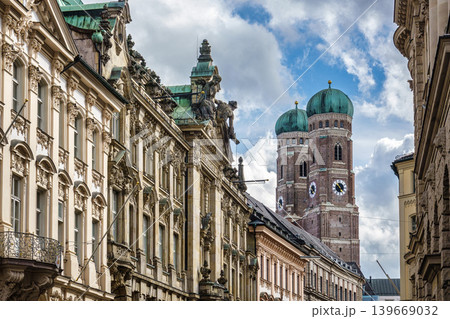 Famous Munich Cathedral, also called Cathedral of Our Dear Lady in Munich, Germany. Seen from Kardinal-Faulhaber street Famous Munich Cathedral, also called Cathedral of Our Dear Lady in Munich, Germany. Seen from Kardinal-Faulhaber street 139669032