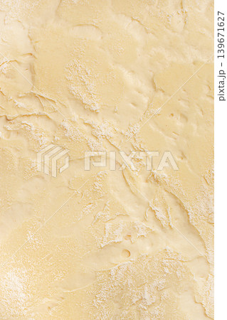 Raw dough texture background with flour dust for bakery design and homemade baking concept Raw dough texture background with flour dust for bakery design and homemade baking concept 139671627