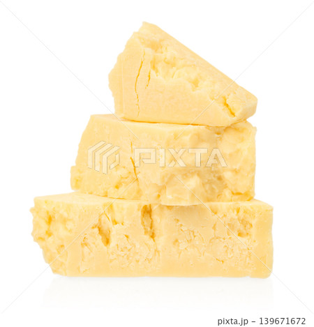 Parmesan cheese pieces isolated on white background Parmesan cheese pieces isolated on white background 139671672