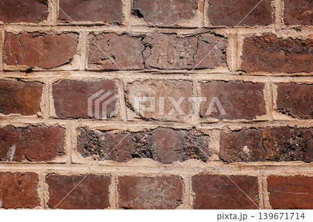 Old brick wall texture background with weathered masonry surface Old brick wall texture background with weathered masonry surface 139671714