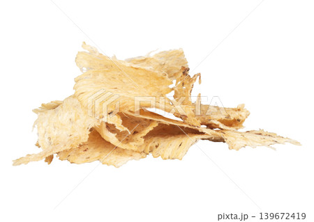 Dried shredded squid isolated on white background Dried shredded squid isolated on white background 139672419
