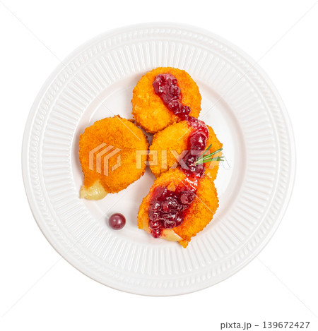 Cheese croquettes with cranberry sauce served on white plate isolated top view 139672427