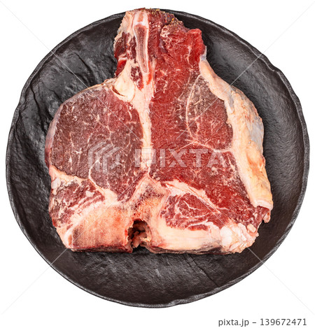Raw porterhouse t-bone steak isolated on light background top view for food packaging and premium meat branding Raw porterhouse t-bone steak isolated on light background top view for food packaging and premium meat branding 139672471