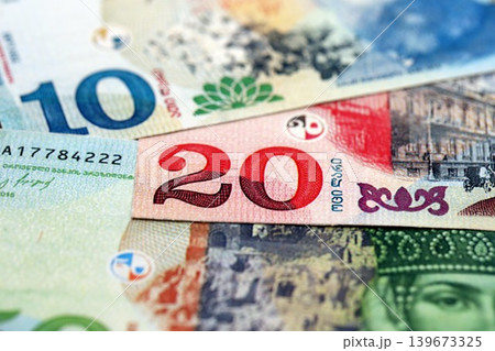 Georgian Lari currency money bills. GEL currency banknotes in pile Georgian Lari currency money bills. GEL currency banknotes in pile 139673325