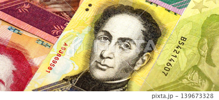 Venezuelan Bolivar currency money bills in big amount. Stack of VED currency banknotes Venezuelan Bolivar currency money bills in big amount. Stack of VED currency banknotes 139673328