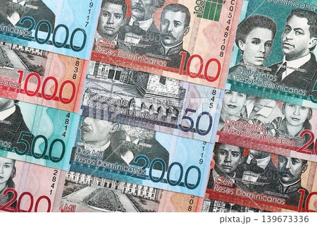 Dominican Republic Pesos currency money bills. DOP currency banknotes in arrange Dominican Republic Pesos currency money bills. DOP currency banknotes in arrange 139673336
