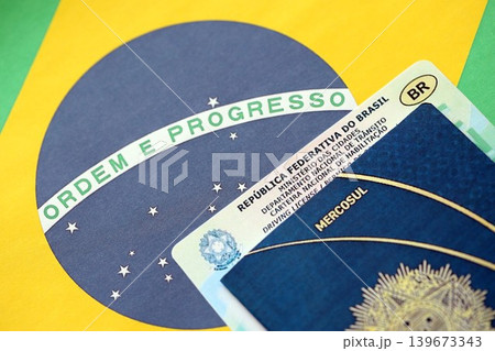 Brazil National Drivers License for a motor vehicle with passport on Brazilian flag Brazil National Drivers License for a motor vehicle with passport on Brazilian flag 139673343
