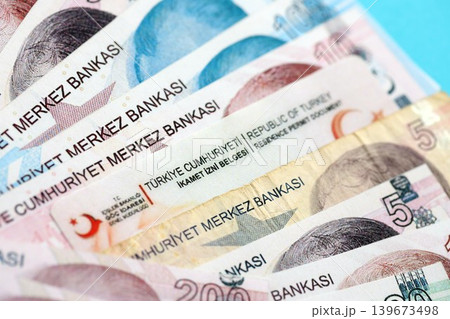 Turkey residence permit card document and turkish liras money bills banknotes. Permanent resident Turkey residence permit card document and turkish liras money bills banknotes. Permanent resident 139673498