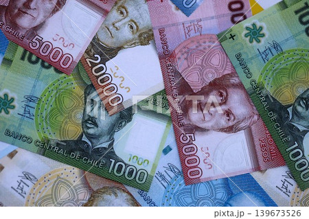 Big amount of chilean pesos moeny bills banknotes. Huge quantity of paper money Big amount of chilean pesos moeny bills banknotes. Huge quantity of paper money 139673526