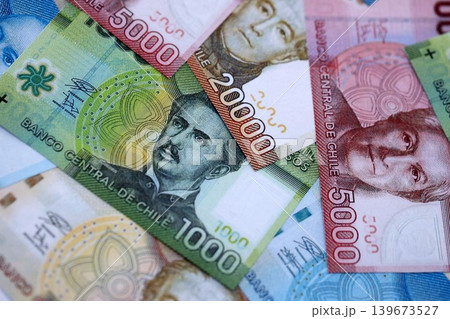 Big amount of chilean pesos moeny bills banknotes. Huge quantity of paper money 139673527