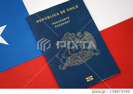 Chilean passport lies on flag background close up. Chile Republic new passport book 139673549