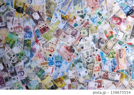 Many banknotes from different countries of the world of different denominations 139673554