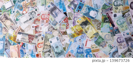 Different various money bills banknotes from random currencies of the world Different various money bills banknotes from random currencies of the world 139673726