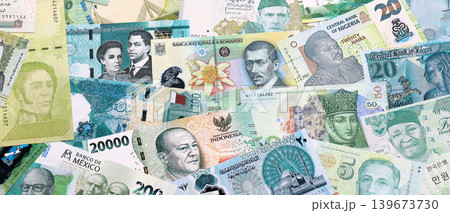Various currencies money bills banknotes in green color. Many cash bills Various currencies money bills banknotes in green color. Many cash bills 139673730