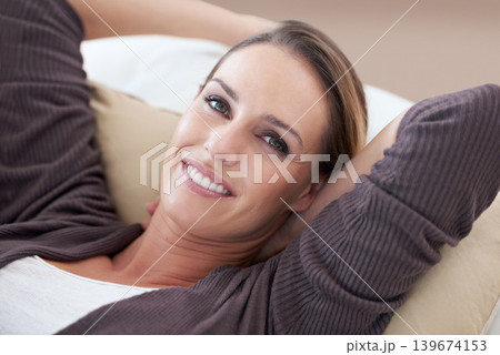 Woman, relax and portrait in living room couch for positive, satisfaction and mindset. Happiness, calm and weekend with female person, home and joy, carefree and comfortable alone in sofa for rest Woman, relax and portrait in living room couch for positive, satisfaction and mindset. Happiness, calm and weekend with female person, home and joy, carefree and comfortable alone in sofa for rest 139674153