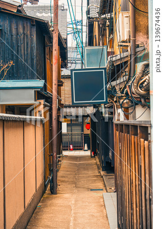 Vintage japanese alley with hanging signs and traditional architecture in Kyoto Vintage japanese alley with hanging signs and traditional architecture in Kyoto 139674436