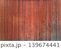Vertical wooden slat wall with rustic weathered texture background Vertical wooden slat wall with rustic weathered texture background 139674441