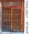 Traditional brown japanese wooden sliding door pattern Traditional brown japanese wooden sliding door pattern 139674442