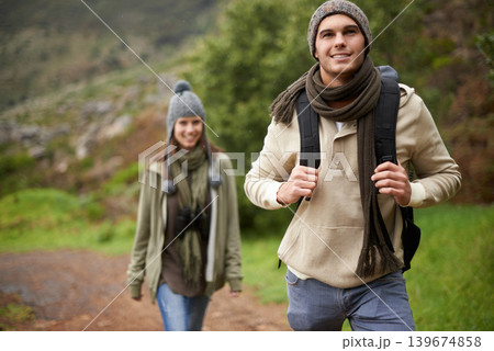 Couple, smile and hiking in forest or nature with travel, adventure or holiday for experience or fitness. Man, woman or trekking outdoor in woods for cardio, exercise or workout with care or backpack Couple, smile and hiking in forest or nature with travel, adventure or holiday for experience or fitness. Man, woman or trekking outdoor in woods for cardio, exercise or workout with care or backpack 139674858