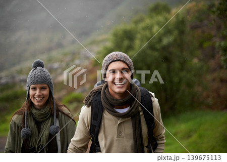 Portrait, hiking and happy with couple, tourist and walking with backpack, mountain and bonding together. Outdoor journey, adventure and trekking in path, field and exercise for fitness and travel Portrait, hiking and happy with couple, tourist and walking with backpack, mountain and bonding together. Outdoor journey, adventure and trekking in path, field and exercise for fitness and travel 139675113