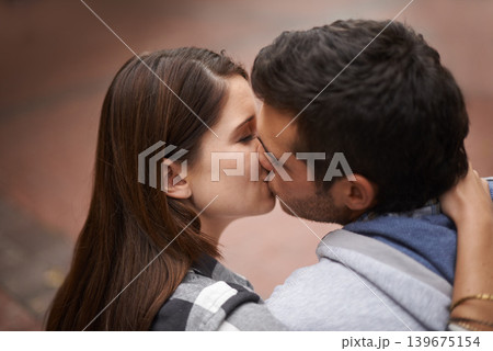 Love, city and face of couple kiss, bonding together and enjoy outdoor date with care, support and partner commitment. Devotion, relationship connection and romantic people in sweet intimate moment Love, city and face of couple kiss, bonding together and enjoy outdoor date with care, support and partner commitment. Devotion, relationship connection and romantic people in sweet intimate moment 139675154