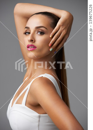 Portrait, makeup and woman for beauty with manicure, rainbow nail polish and skin with cosmetics on grey background. Pink lipstick, color nails and model with confidence in studio and glamour Portrait, makeup and woman for beauty with manicure, rainbow nail polish and skin with cosmetics on grey background. Pink lipstick, color nails and model with confidence in studio and glamour 139675226