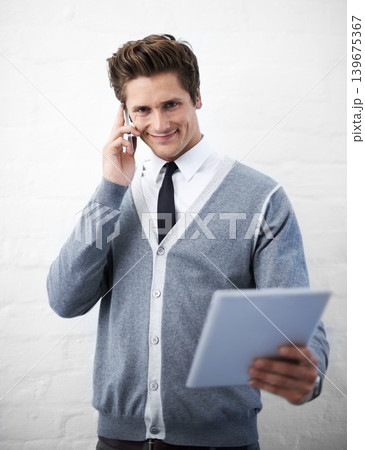 Business man, phone call and tablet in portrait, smile and contact with networking by wall background. Entrepreneur, employee or person with digital touchscreen, smartphone and happy for notification Business man, phone call and tablet in portrait, smile and contact with networking by wall background. Entrepreneur, employee or person with digital touchscreen, smartphone and happy for notification 139675367