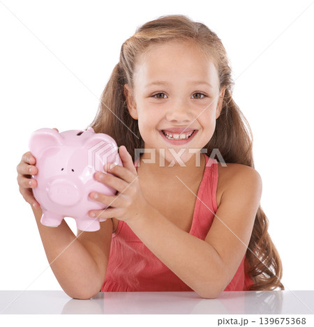 Piggy bank, save money and girl child in portrait, finance and learning cash management on white background. Budget, growth and investment, young person and financial security for future in studio Piggy bank, save money and girl child in portrait, finance and learning cash management on white background. Budget, growth and investment, young person and financial security for future in studio 139675368