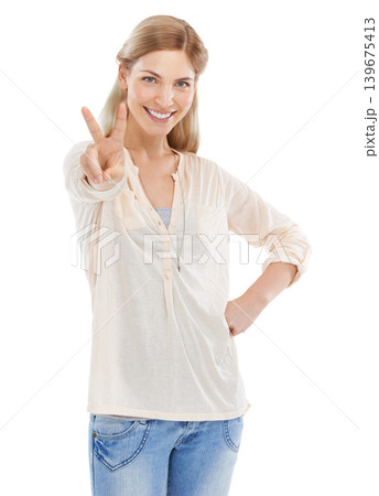 Smile, peace sign and portrait of woman in studio isolated on a white background. Happy, fingers and v hand gesture, emoji and young model with symbol for victory, success and winning on social media 139675413
