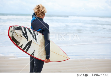 Surfer, man and back view on beach with surfboard, vacation and adventure for fitness and travel. Ocean, waves for surfing and seaside holiday in Hawaii, nature and tourism with extreme sports Surfer, man and back view on beach with surfboard, vacation and adventure for fitness and travel. Ocean, waves for surfing and seaside holiday in Hawaii, nature and tourism with extreme sports 139675448