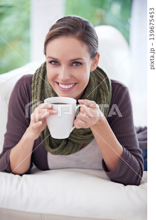 Woman, happy in portrait and coffee, relax in apartment for comfort or morning routine with warm drink. Caffeine beverage in living room, latte or espresso for chill at home with positive attitude Woman, happy in portrait and coffee, relax in apartment for comfort or morning routine with warm drink. Caffeine beverage in living room, latte or espresso for chill at home with positive attitude 139675453