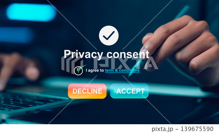 User signing privacy consent form on digital tablet for data protection and GDPR compliance with personal information security concept. 139675590