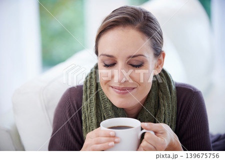 Woman, smell coffee and relax in apartment for comfort or morning routine with warm drink. Caffeine beverage, latte or espresso with peace and calm for chill at home with positive attitude and aroma 139675756
