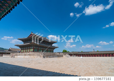 Seoul, South Korea - May. 14, 2026 : Historical Geunjeongjeon Hall in Gyeongbokgung Palace under a blue sky with white clouds, Seoul, South Korea Seoul, South Korea - May. 14, 2026 : Historical Geunjeongjeon Hall in Gyeongbokgung Palace under a blue sky with white clouds, Seoul, South Korea 139677181