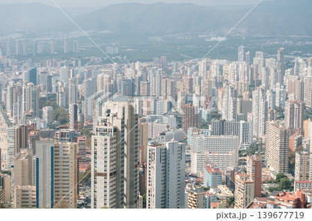Urban skyline of benidorm with mountains in the background 139677719