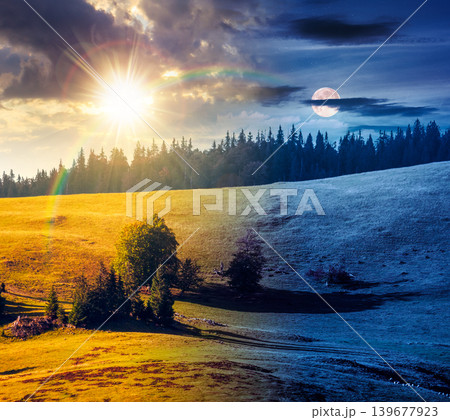 hillside of mountain range with coniferous forest and meadow. day meet night. wonderful view of a grassy meadow on steep hill. sun and moon over nature background of apuseni natural park, romania 139677923