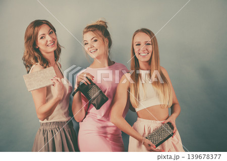 Elegant women holding hand purse wallet 139678377