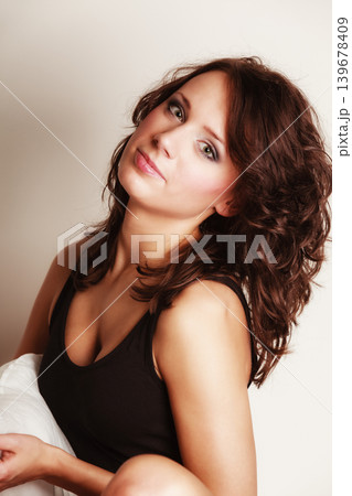 Sexy girl lazy woman with pillow on bed in bedroom Sexy girl lazy woman with pillow on bed in bedroom 139678409