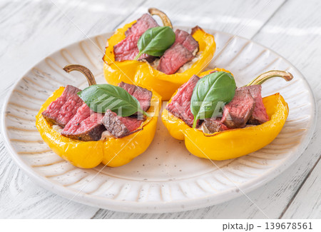 Roasted Yellow Bell Peppers Stuffed With Cream Cheese And Juicy Steak Slices 139678561