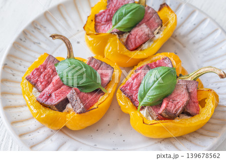 Roasted Yellow Bell Peppers Stuffed With Cream Cheese And Juicy Steak Slices Roasted Yellow Bell Peppers Stuffed With Cream Cheese And Juicy Steak Slices 139678562