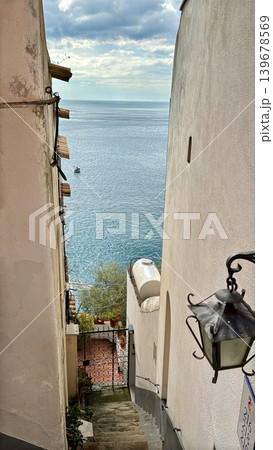 Narrow street view with sea and beach in Positano Italy Narrow street view with sea and beach in Positano Italy 139678569